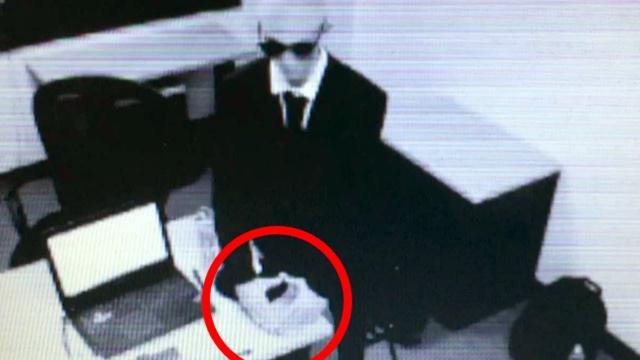 Men in Black Caught on Tape by Security Camera