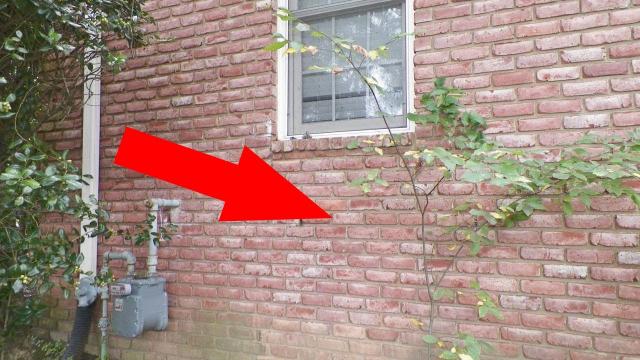 Man Removing Bricks Discovers A Huge Hidden Surprise Behind Them