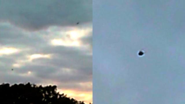 Two Dark Sphere Metallic UFOs Filmed Over East Kilbride In Scotland