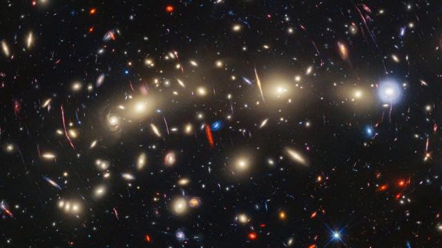 Webb and Hubble telescopes deliver mind-boggling view of huge galaxy cluster