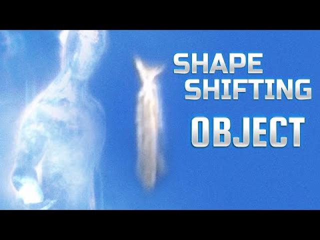 UFO SIGHTING NEWS : SHAPE SHIFTING UFO Filmed from Airplane at 30000 Feet ????