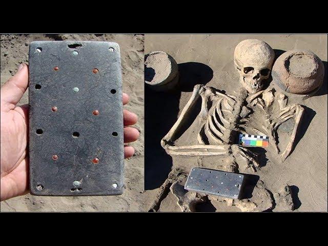Archaeologists Find Mysterious iPhone Shaped, Gem Studded Object at Ancient Siberian Burial Ground