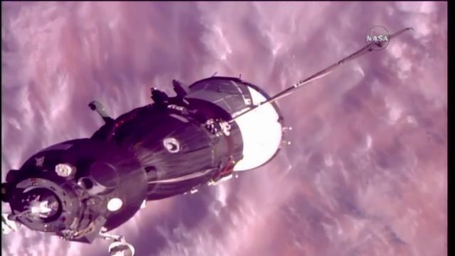 New Crew Docks with Space Station Aboard Soyuz Spacecraft