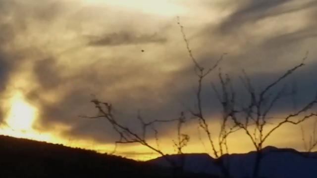 Stunning Large Black UFO Filmed Hovering over Mule Mountains in Arizona - FindingUFO