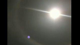 UFO Sightings Spectacular Purple UFO Spotted in a Sun Halo! Florida Beach 2012 Planet Nibiru?