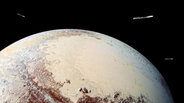 Were Large UFOs Seen Surrounding Pluto?