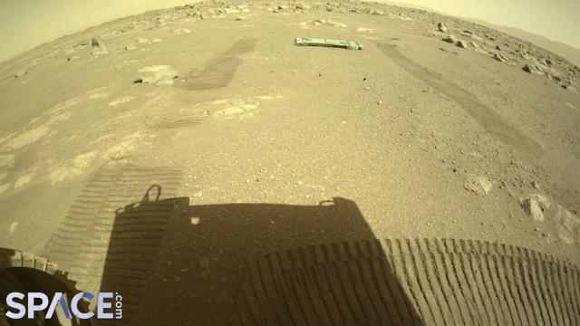 Perserverance's ejected 'belly pan' seen in distance in latest Mars pics