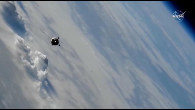 Crew of 3 arrive at space station aboard Soyuz spacecraft in these docking highlights