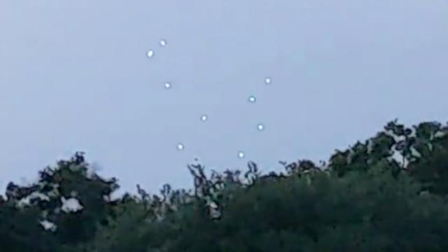 Strange Group of Bright Glowing UFO Orbs Sighted Hovering over Tampa Bay, Florida