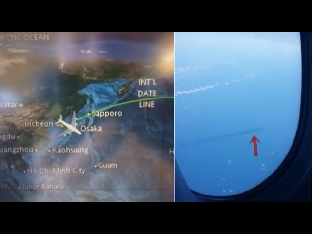 Airplane passenger captures an alien craft "Fast Mover" under the water