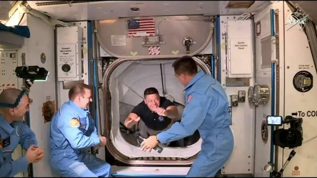 SpaceX Demo-2 crew opens hatch and enters space station