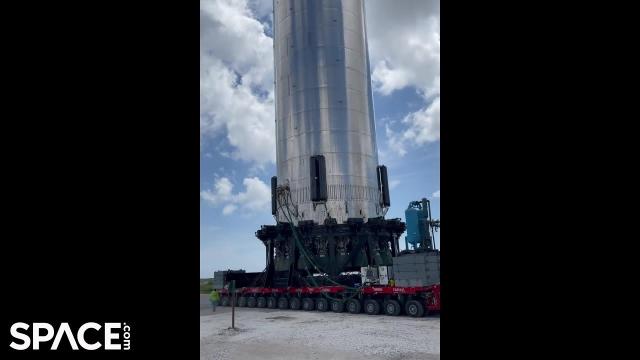 SpaceX Super Heavy Booster 4 rolled out to launch site