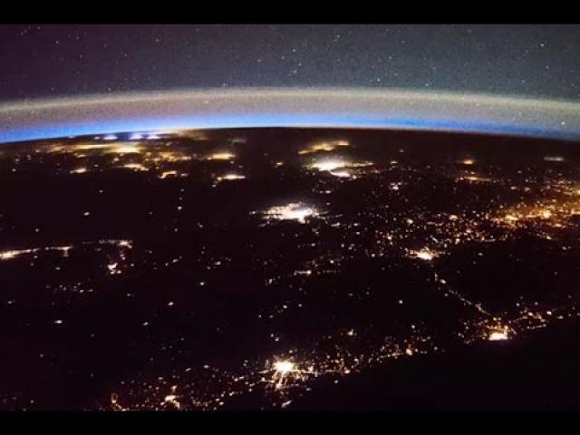 Lightning and 'Probably Satellites' Seen from Space Station