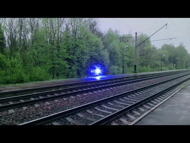Look at this glowing orb crossing railway tracks… What the heck is that?