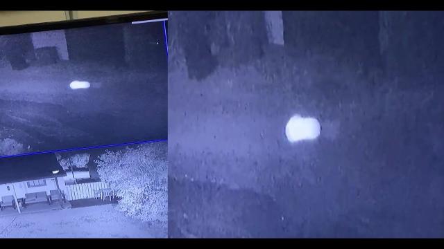 Weird T shaped Orb hovering on security monitor in Saskatoon, Saskatchewan