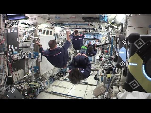 Astronauts show off 'synchronized space swimming' skills on space station
