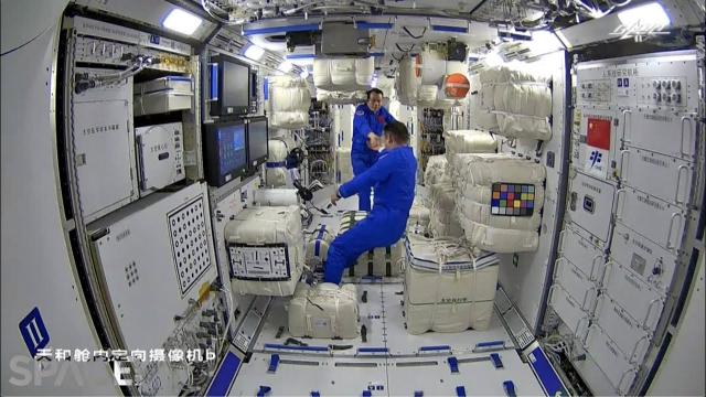 Chinese astronauts enter new space station after 6.5 hour flight
