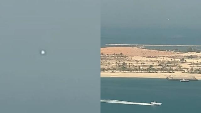White Spherical UFO Captured Hovering over Abu Dhabi in United Arab Emirates