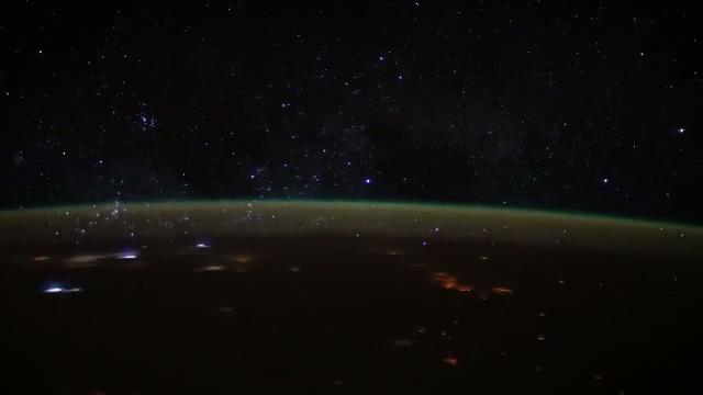 Lightning, Milky Way, satellites & aurora in stunning ISS cupola time-lapse