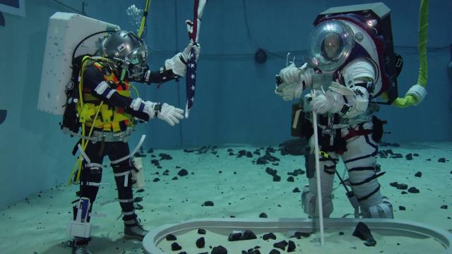 Astronauts Test Tools Spacesuits Facilities in Preparation for Moonwalks
